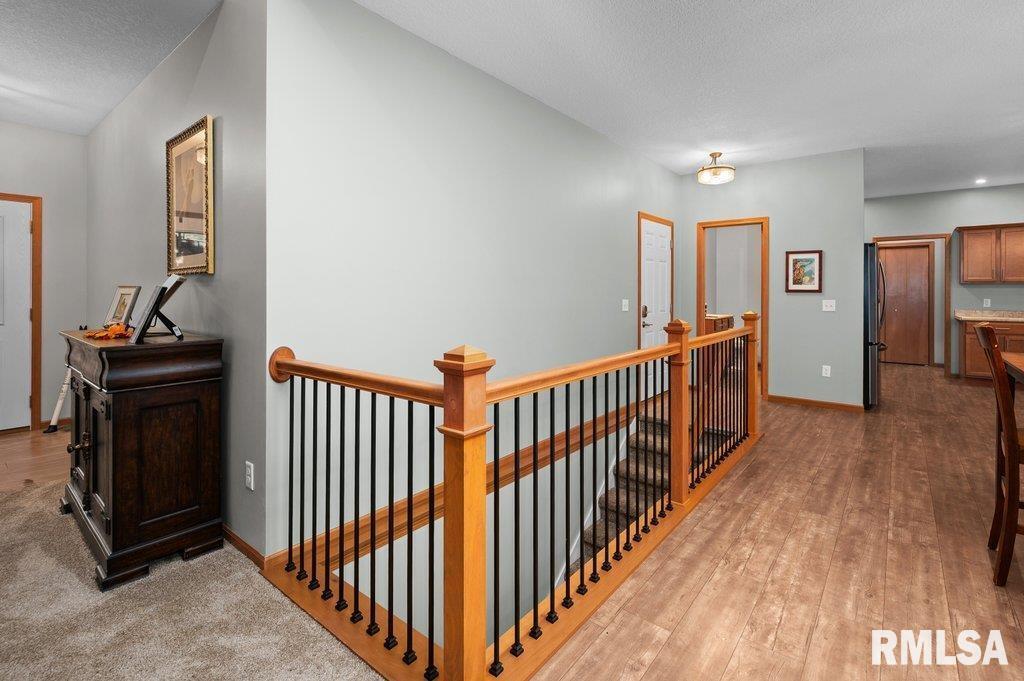 1215 Waverly Road Davenport, IA 52804 - Photo 14 of 34 a view of a hallway with workspace
