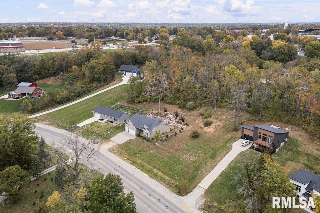 1215 Waverly Road Davenport, IA 52804 - Photo 4 of 34 an aerial view of a house with a yard