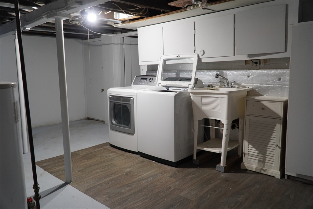 122 Norman Street West Springfield, MA 01089 - Photo 11 of 28 a utility room with washer and dryer