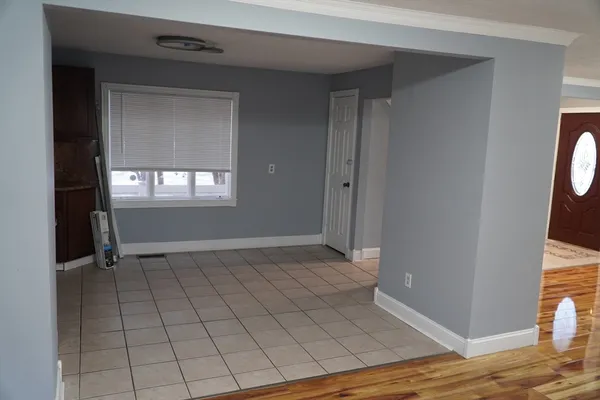 a view of an empty room and window