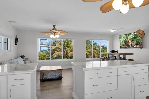 a kitchen with sink and window