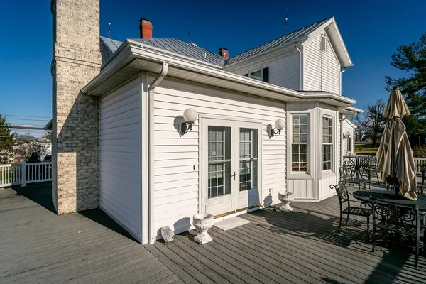 a view of a back yard of the house