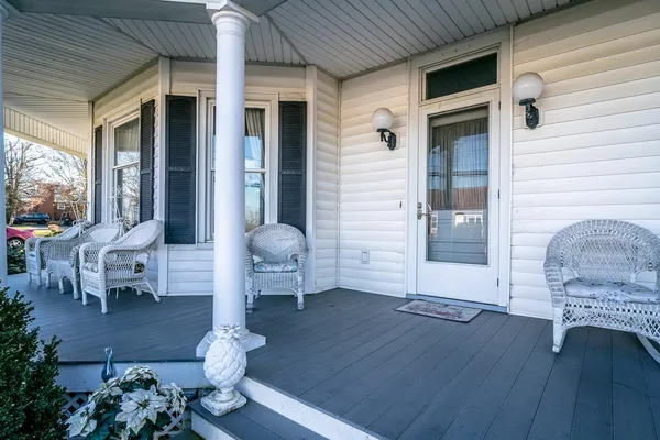 a view of living room and wooden floor