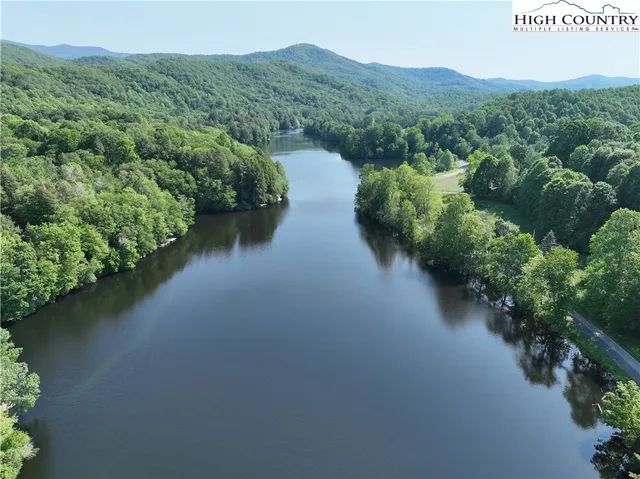 a view of a lake with mountain