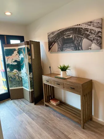 a view of workspace with wooden floor