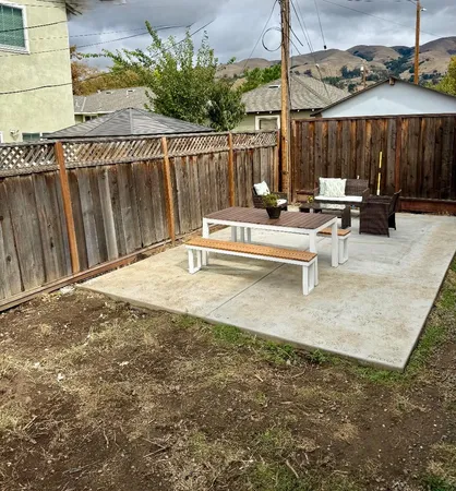 a view of swimming pool with a patio