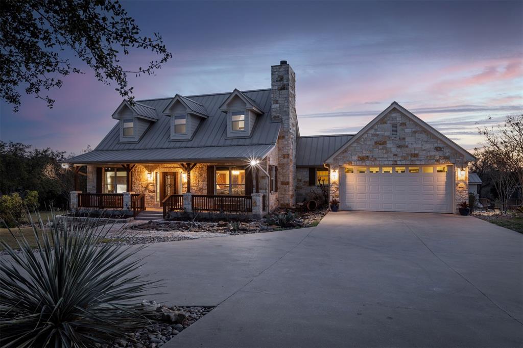 5300 Lookout Ridge Drive Marble Falls, TX 78654 - Photo 13 of 40 a view of a house with a yard