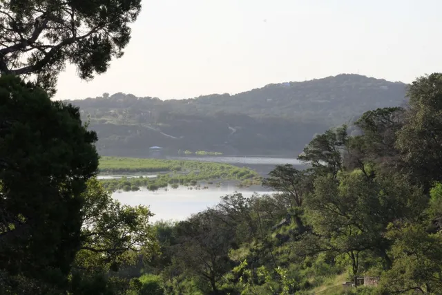 a view of a lake with a mountain in the background