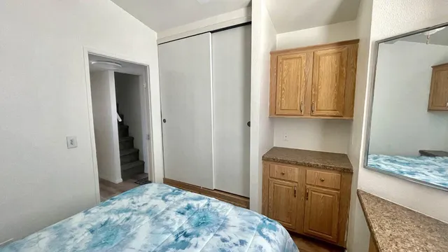 a bathroom with a toilet and a bathtub