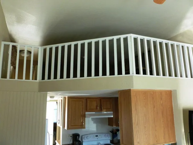a view of wooden floor and a small space