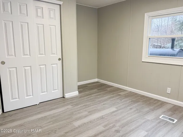 a bathroom with a toilet a sink and bathtub