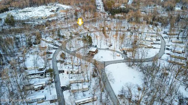 a kitchen with stainless steel appliances a stove a refrigerator and a sink