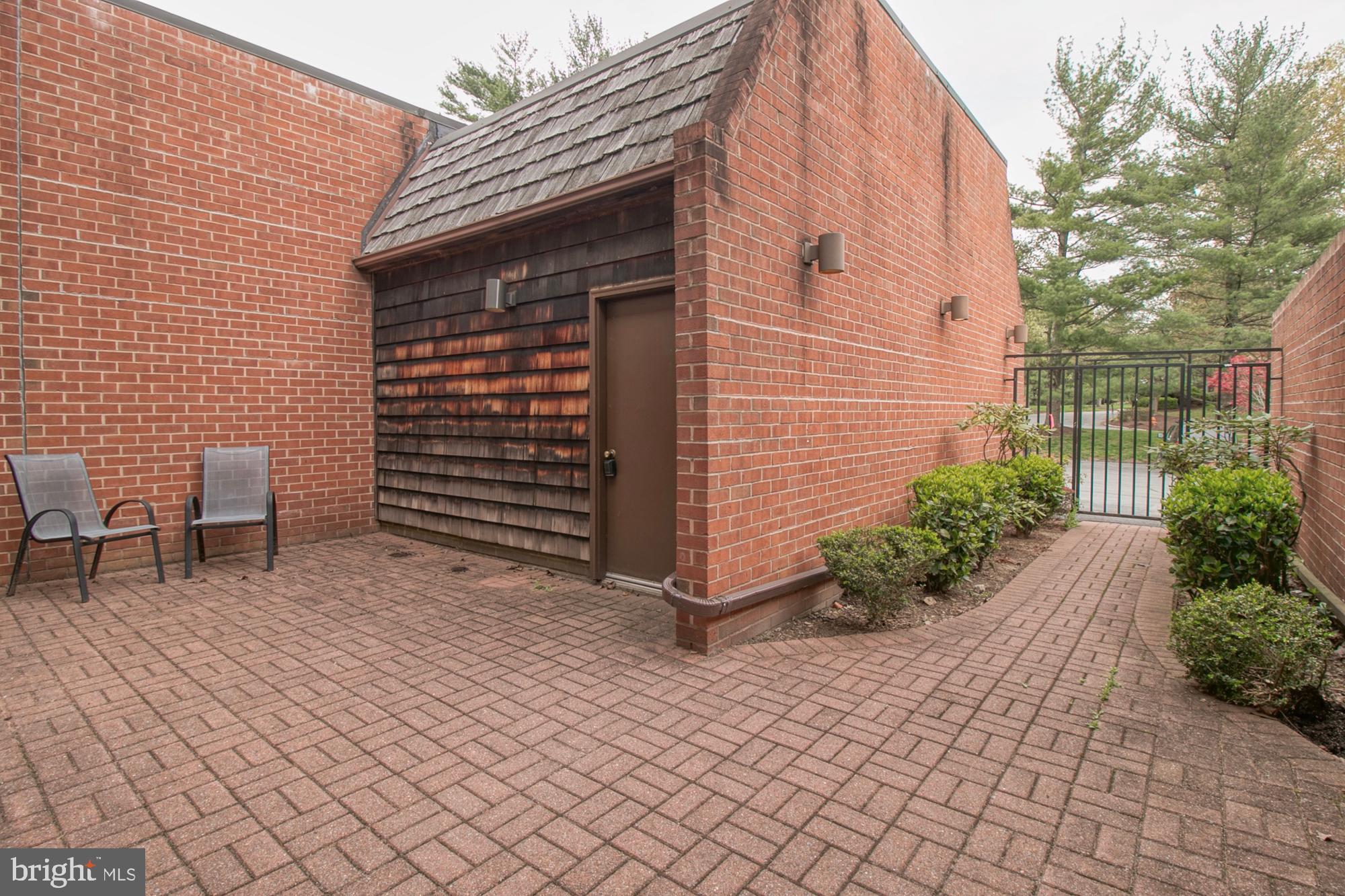 508 Old Crossing Drive Baltimore, MD 21208 - Photo 4 of 47 Access to garage from courtyard