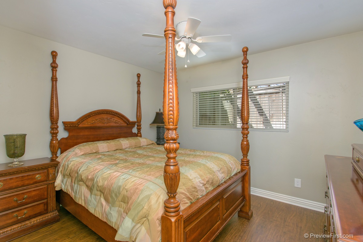 1748 Avocado Road Oceanside, CA 92054 - Photo 14 of 23 Spacious downstairs bedroom with new hardwood floor