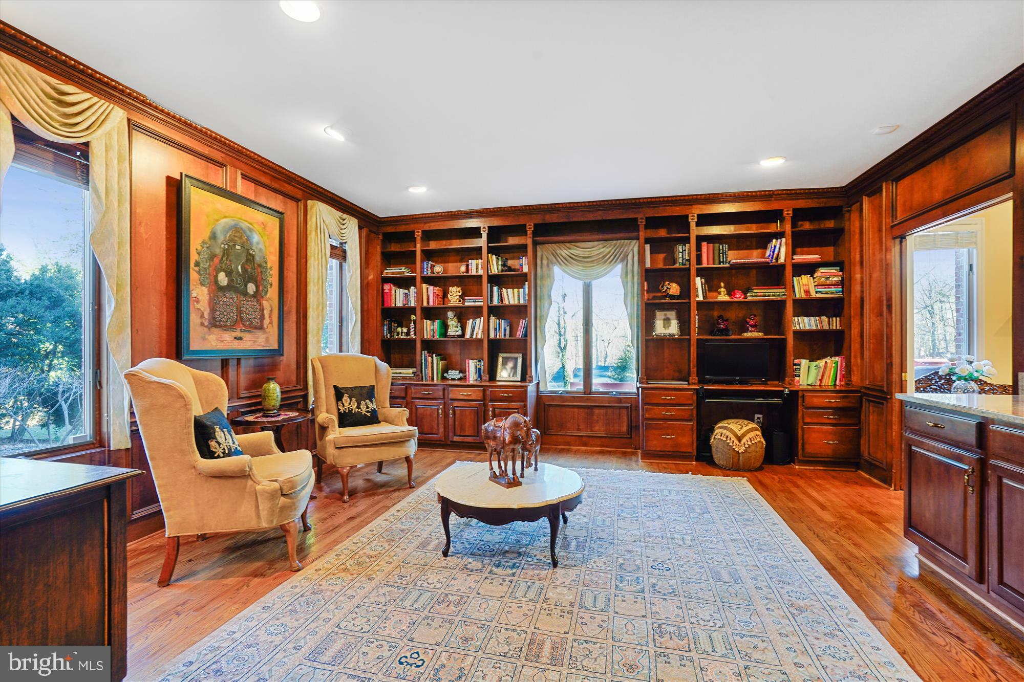 1071 Spring Hill Road McLean, VA 22102 - Photo 17 of 65 a living room with furniture a rug and a large window