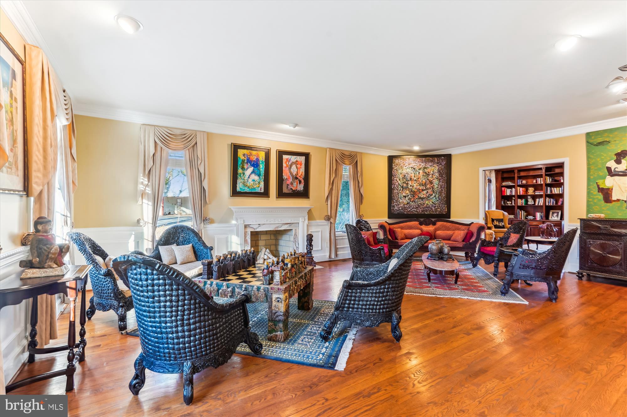 1071 Spring Hill Road McLean, VA 22102 - Photo 19 of 65 a living room with furniture and a flat screen tv