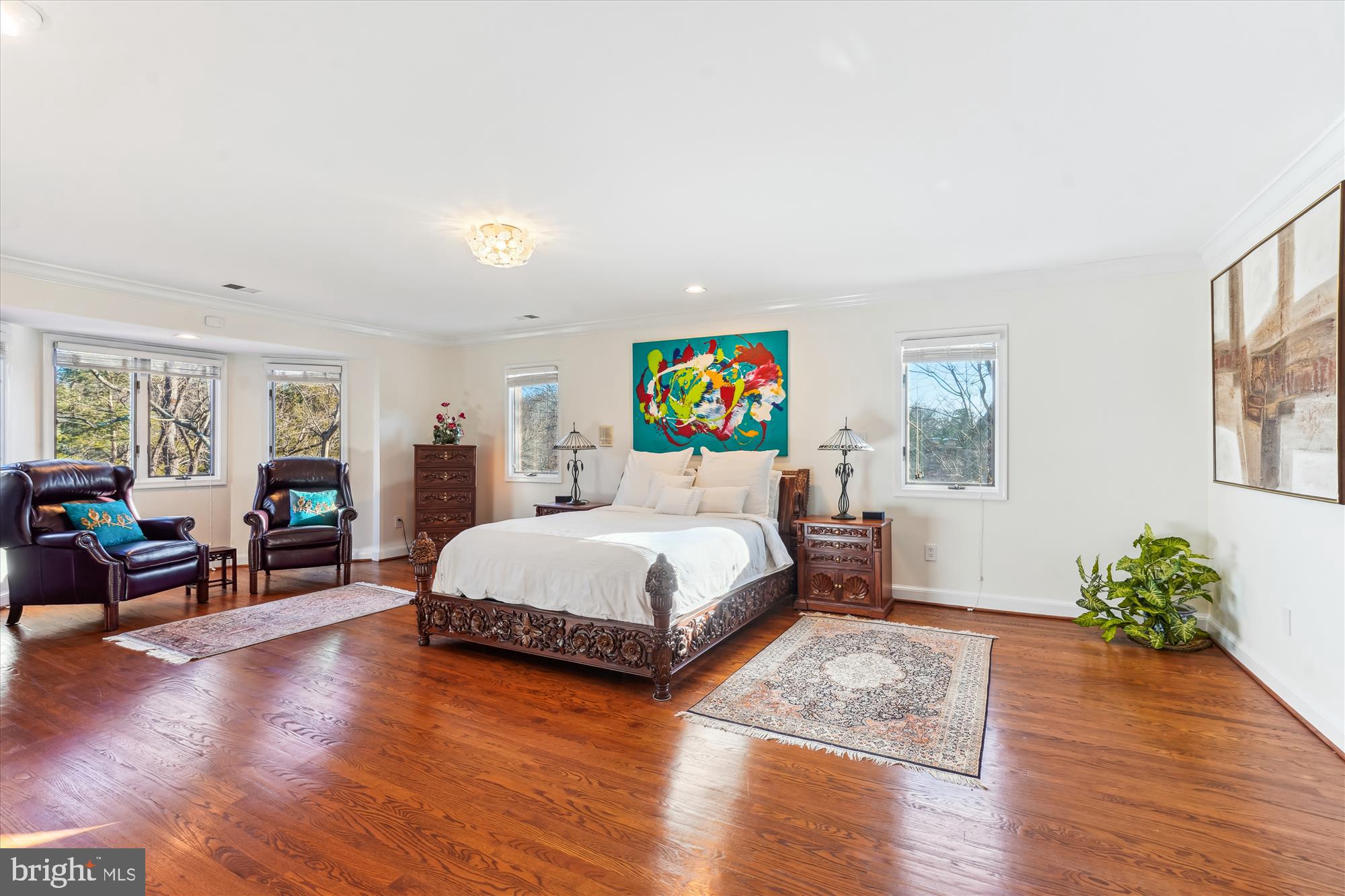1071 Spring Hill Road McLean, VA 22102 - Photo 22 of 65 a bedroom with a bed and wooden floor