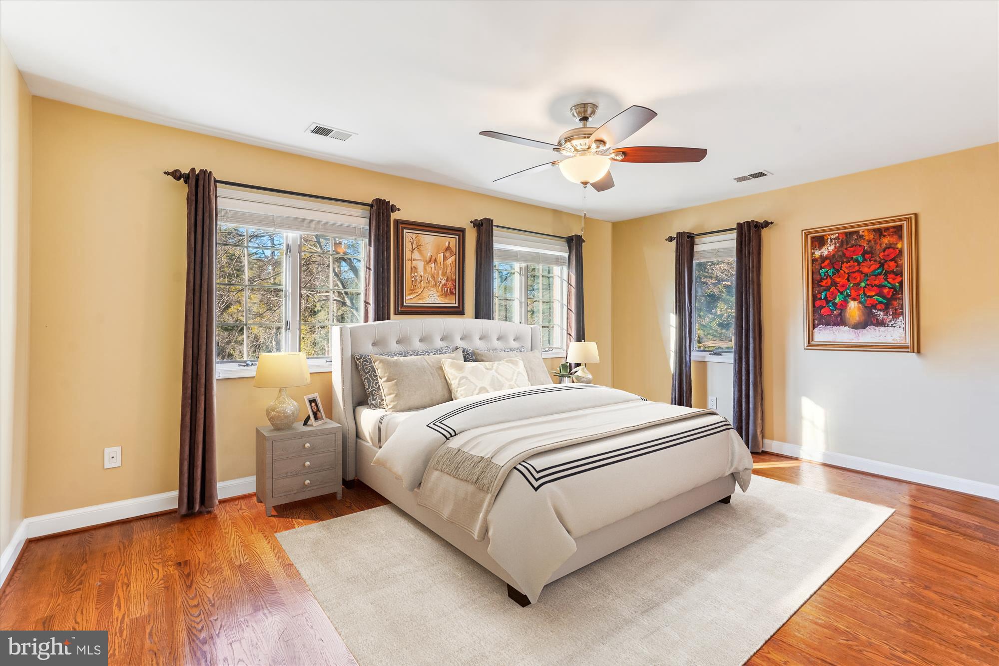 1071 Spring Hill Road McLean, VA 22102 - Photo 30 of 65 a spacious bedroom with a large bed and a chandelier
