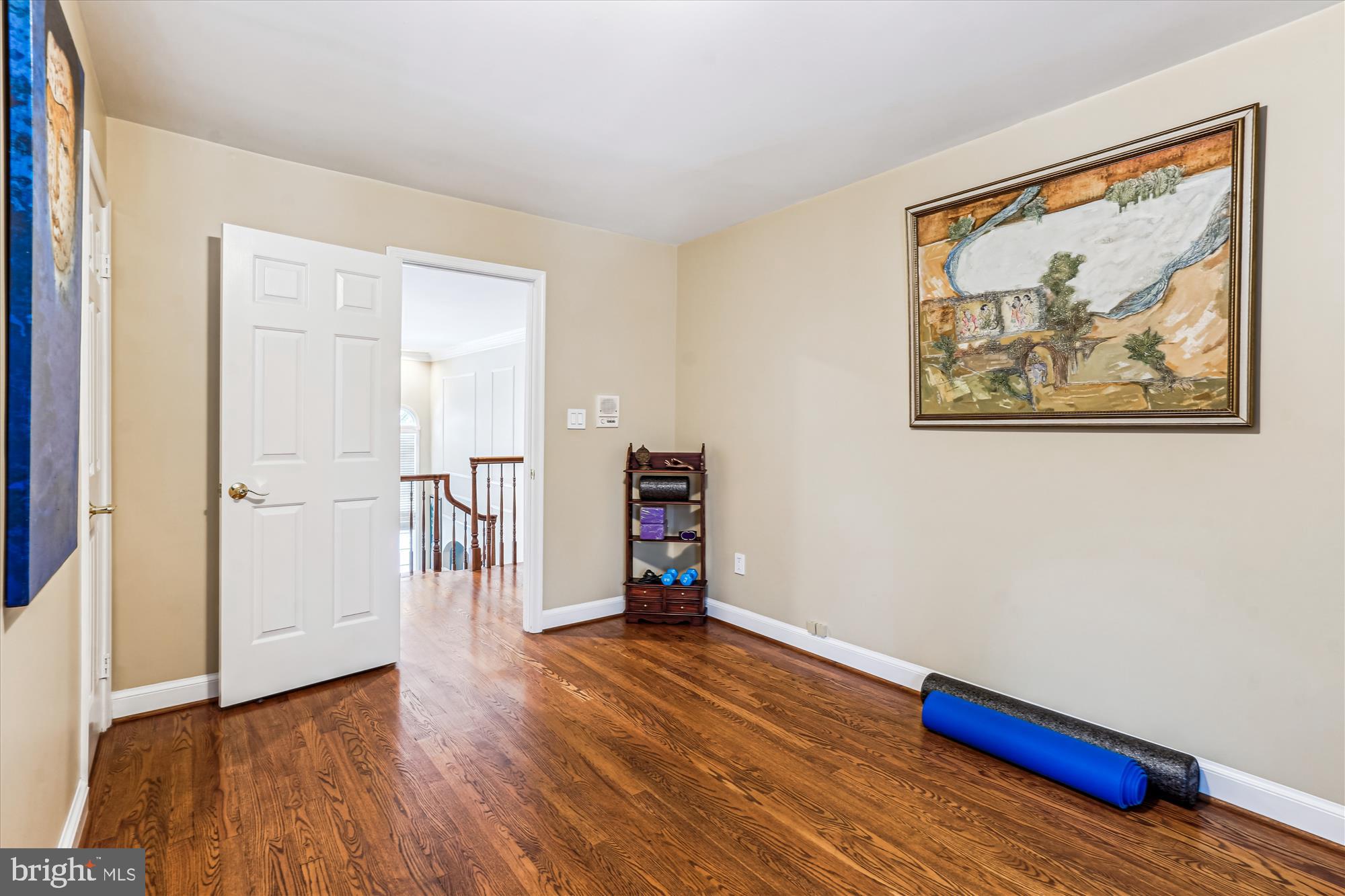 1071 Spring Hill Road McLean, VA 22102 - Photo 33 of 65 a view of an empty room with wooden floor and a window