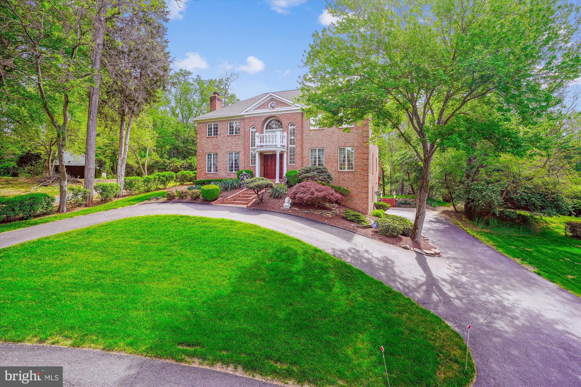 1071 Spring Hill Road McLean, VA 22102 - Photo 45 of 65 a view of an house with backyard space and garden