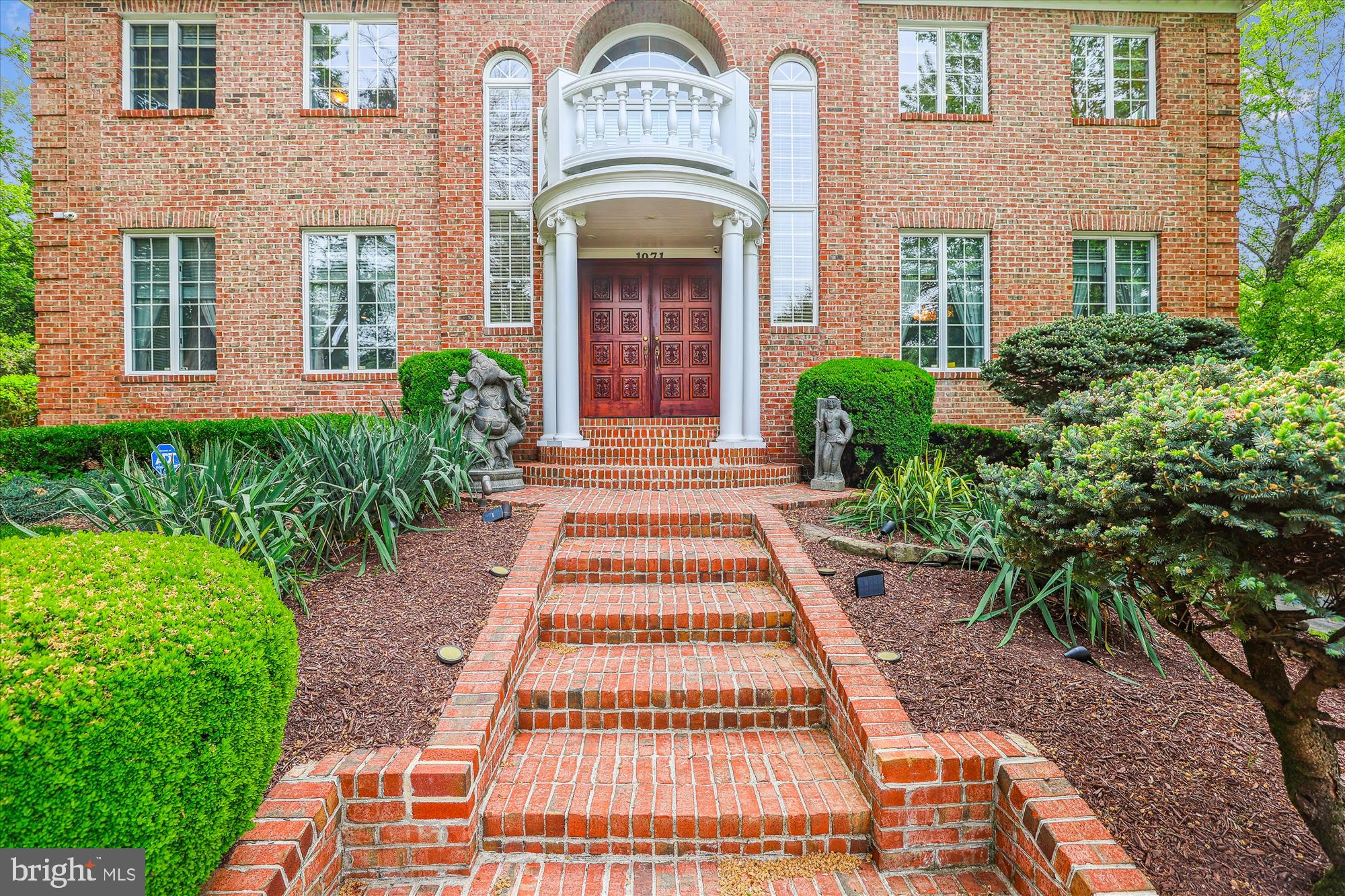 1071 Spring Hill Road McLean, VA 22102 - Photo 48 of 65 a front view of a building