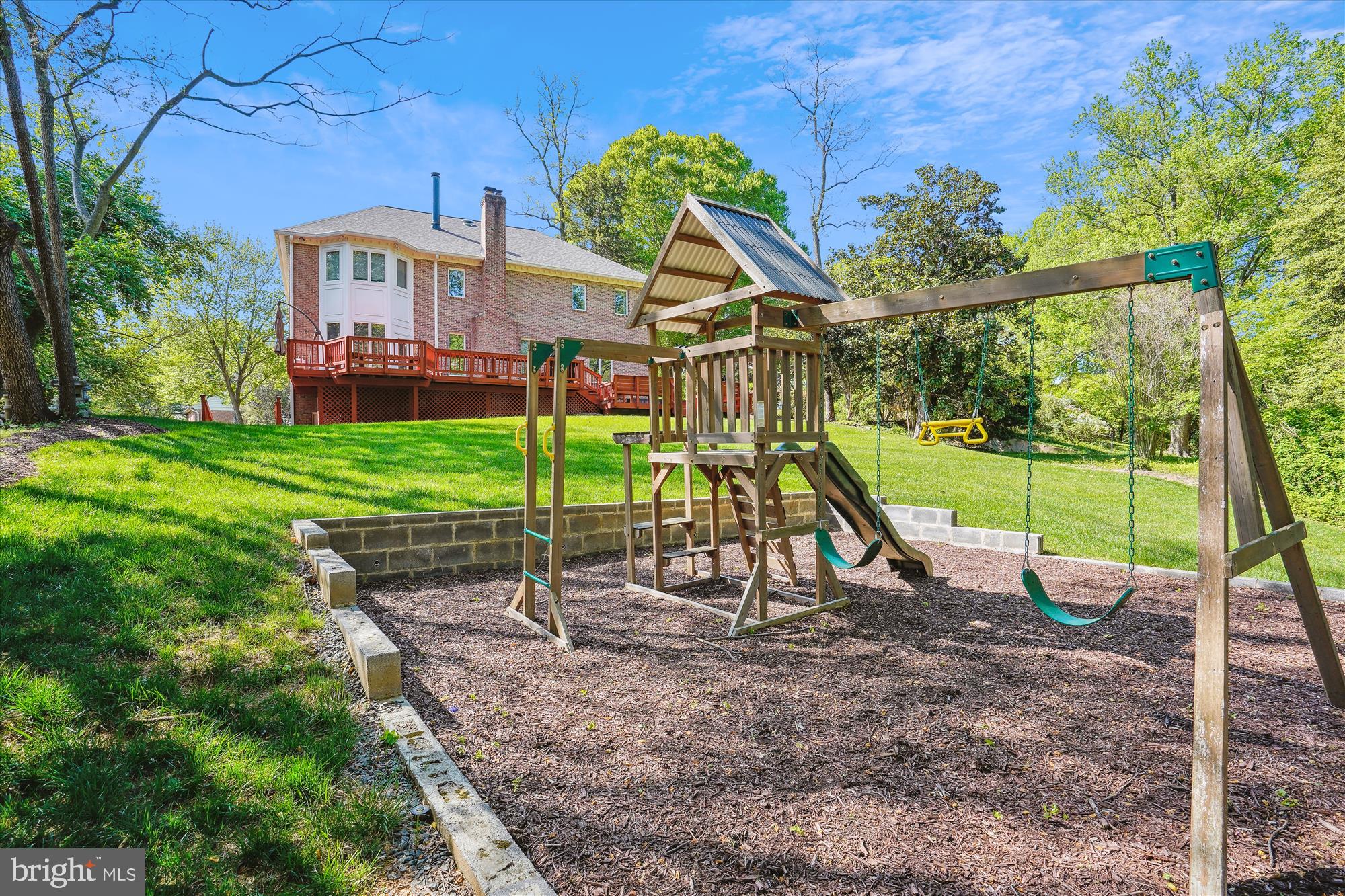 1071 Spring Hill Road McLean, VA 22102 - Photo 49 of 65 a view of a house with a yard and sitting area