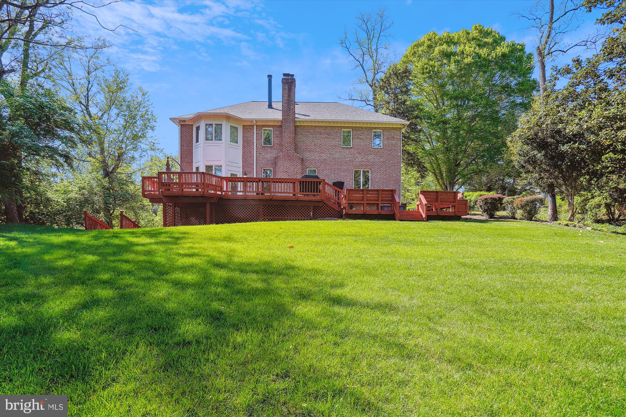 1071 Spring Hill Road McLean, VA 22102 - Photo 50 of 65 a view of a house with a yard and sitting area