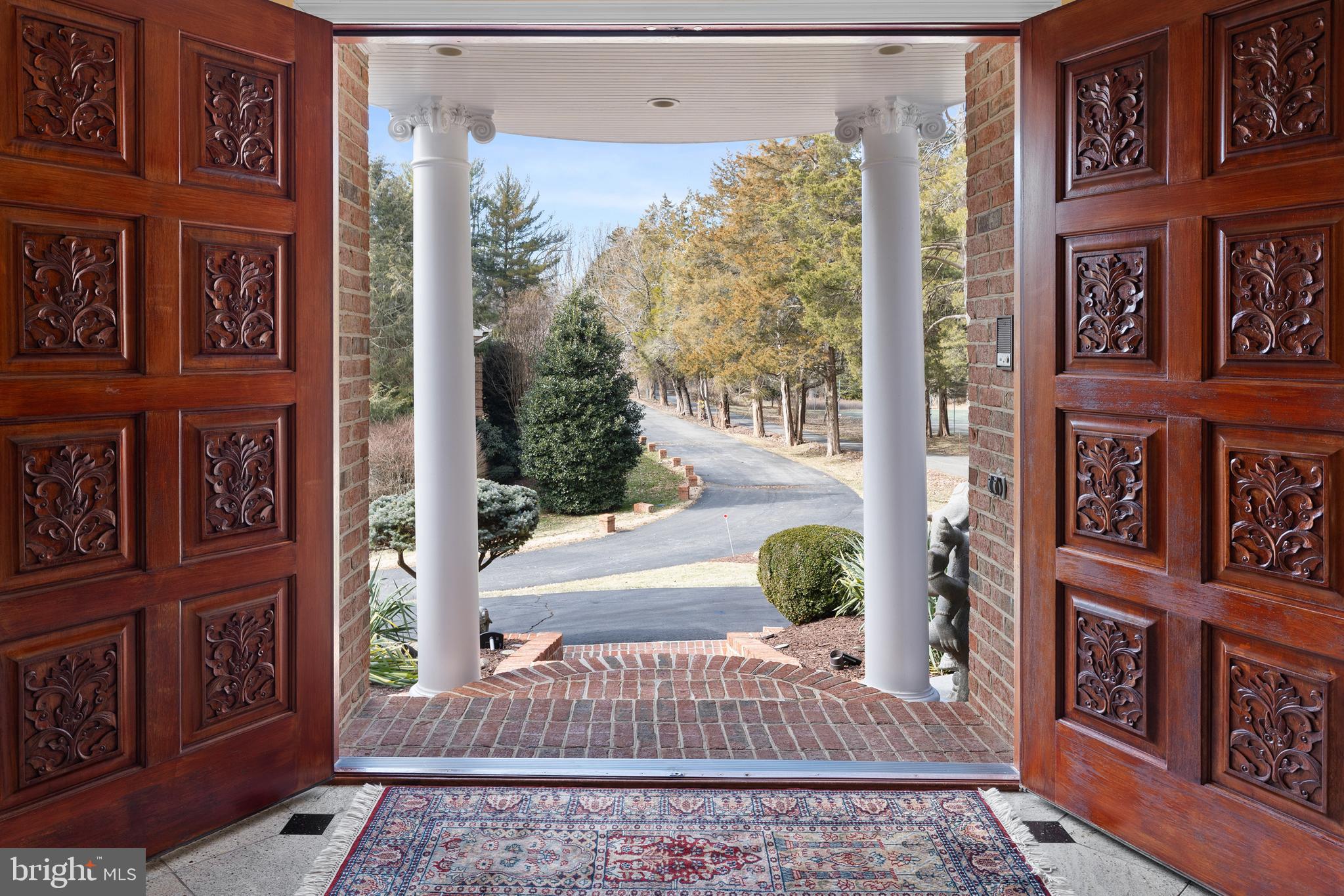 1071 Spring Hill Road McLean, VA 22102 - Photo 5 of 65 a view of a entryway door of the house