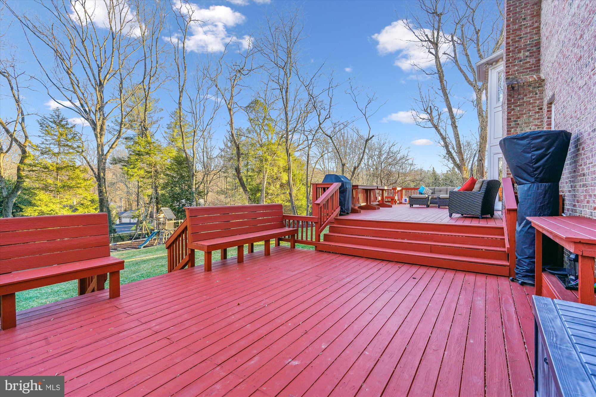 1071 Spring Hill Road McLean, VA 22102 - Photo 51 of 65 a backyard of a house with wooden floor and outdoor seating