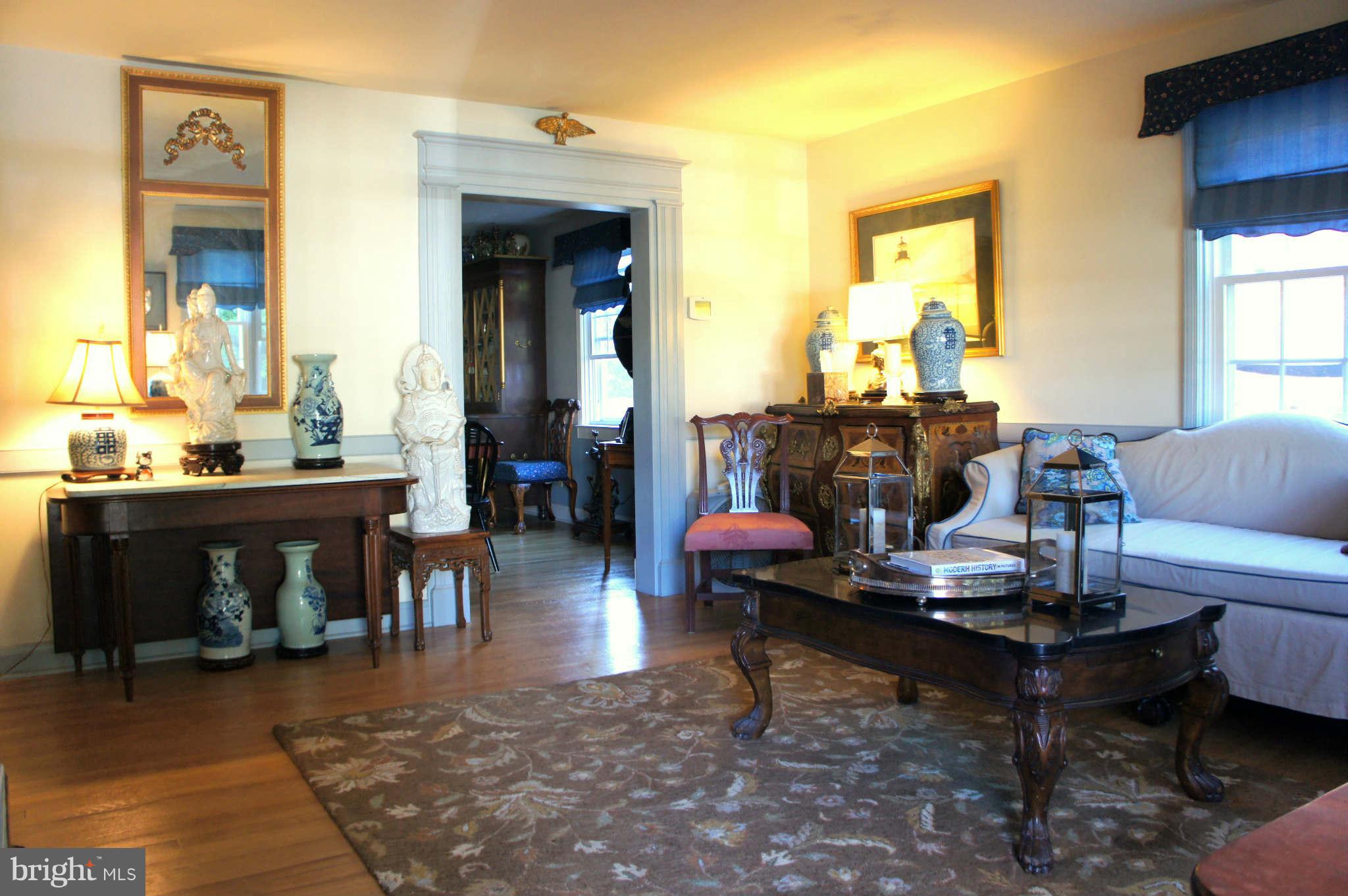 151 Stanmore Road Baltimore, MD 21212 - Photo 2 of 29 a living room with furniture and a fireplace
