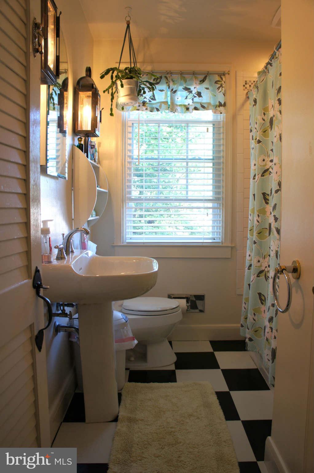 151 Stanmore Road Baltimore, MD 21212 - Photo 14 of 29 a bathroom with a sink toilet and shower