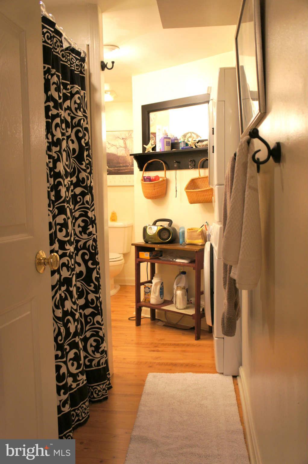 151 Stanmore Road Baltimore, MD 21212 - Photo 19 of 29 a picture of a bathroom with a shower curtain