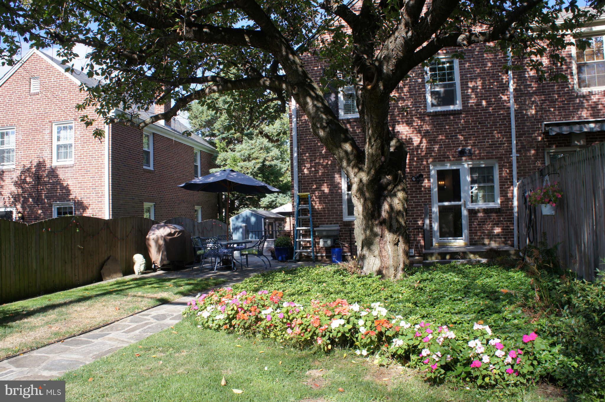 151 Stanmore Road Baltimore, MD 21212 - Photo 22 of 29 a front view of a house with garden