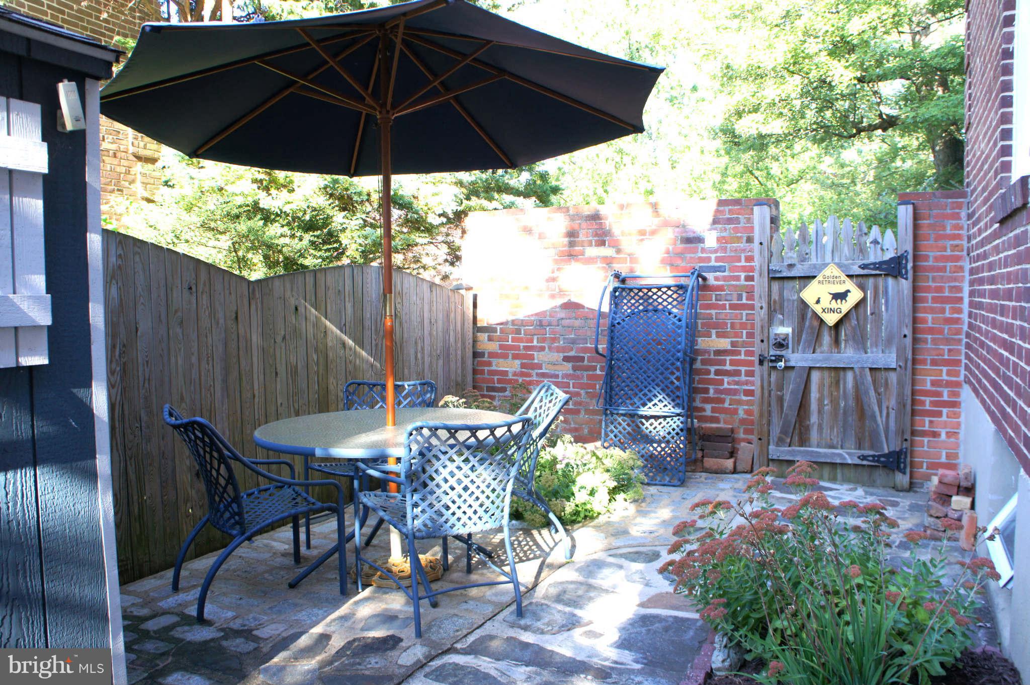 151 Stanmore Road Baltimore, MD 21212 - Photo 24 of 29 a view of an outdoor sitting area with furniture and backyard