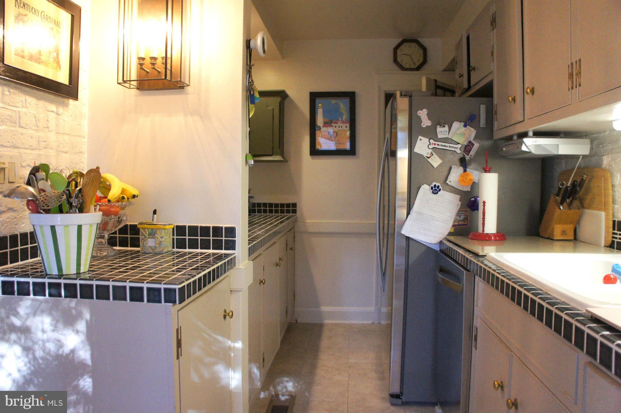 151 Stanmore Road Baltimore, MD 21212 - Photo 7 of 29 a view of a kitchen and utility room