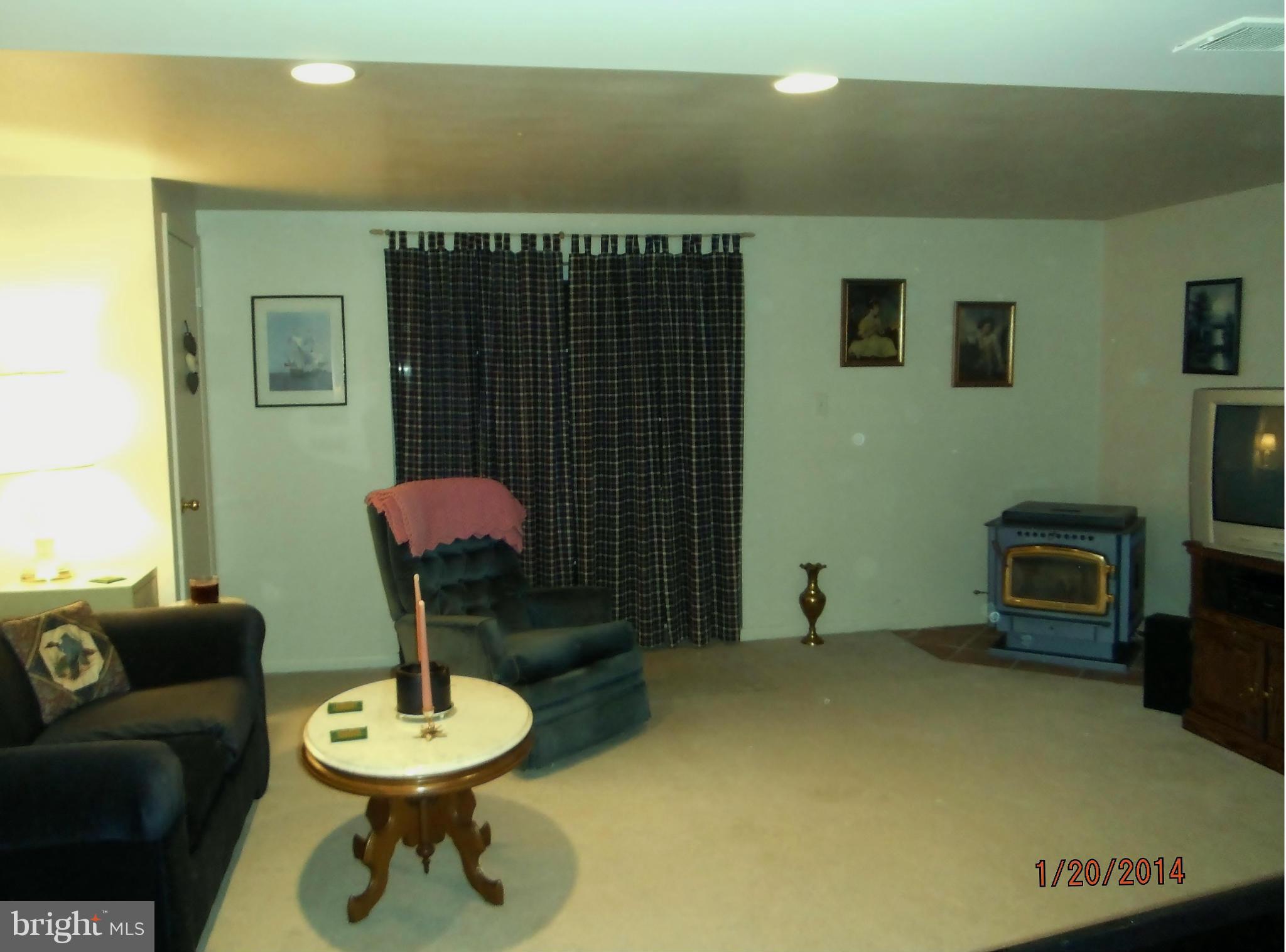9903 Maidbrook Road Baltimore, MD 21234 - Photo 26 of 30 Lower Level Family Rm w/Pellet Stove