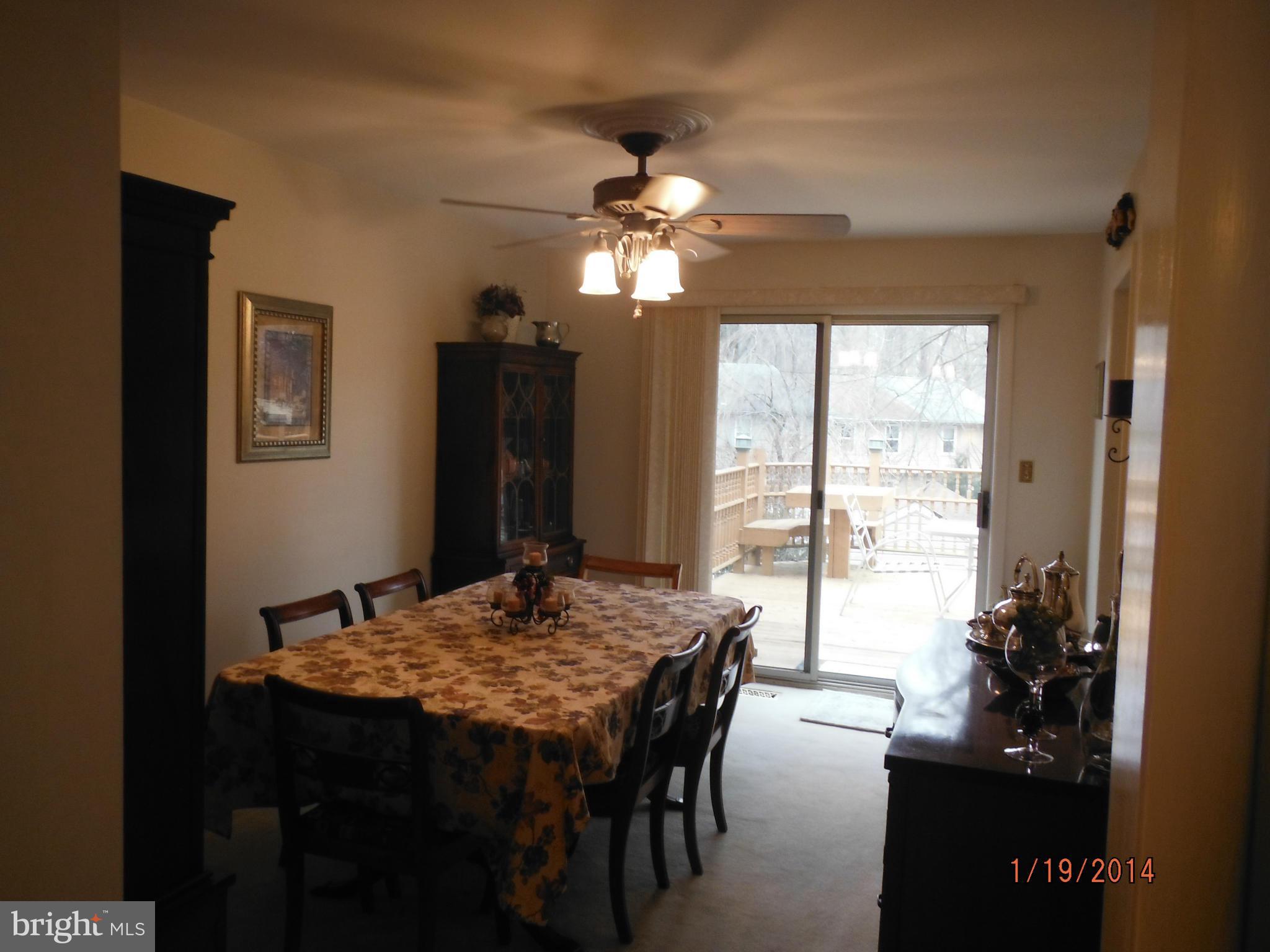 9903 Maidbrook Road Baltimore, MD 21234 - Photo 8 of 30 Dining Rm w/Sliders to Lrg Deck