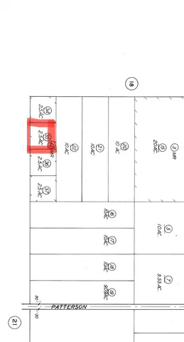 a picture of a cabinet with a white wall