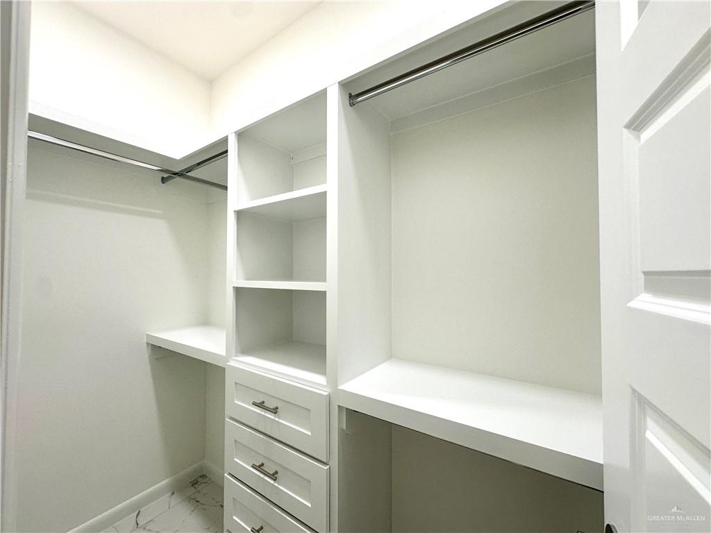 2404 East Viviana Street, Unit 1 Edinburg, TX 78542 - Photo 10 of 14 a view of an empty walk in closet