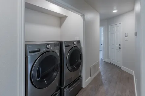 a utility room with dryer and washer