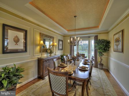 910 Gladway Road Baltimore, MD 21220 - Photo 15 of 18 a dining room with furniture and window