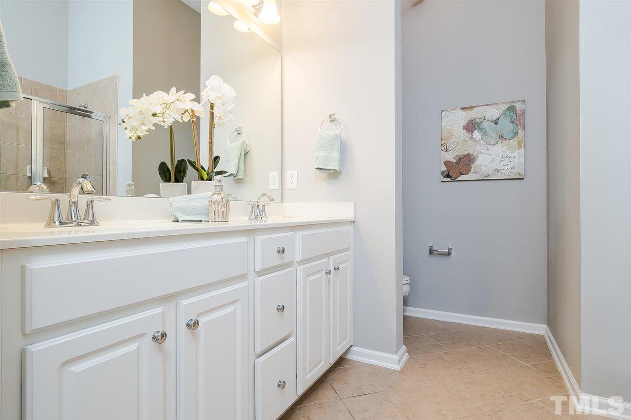 4624 Springerly Lane Raleigh, NC 27612 - Photo 4 of 11 Dual vanity, tile surround shower, separate garden tub and tile floors!