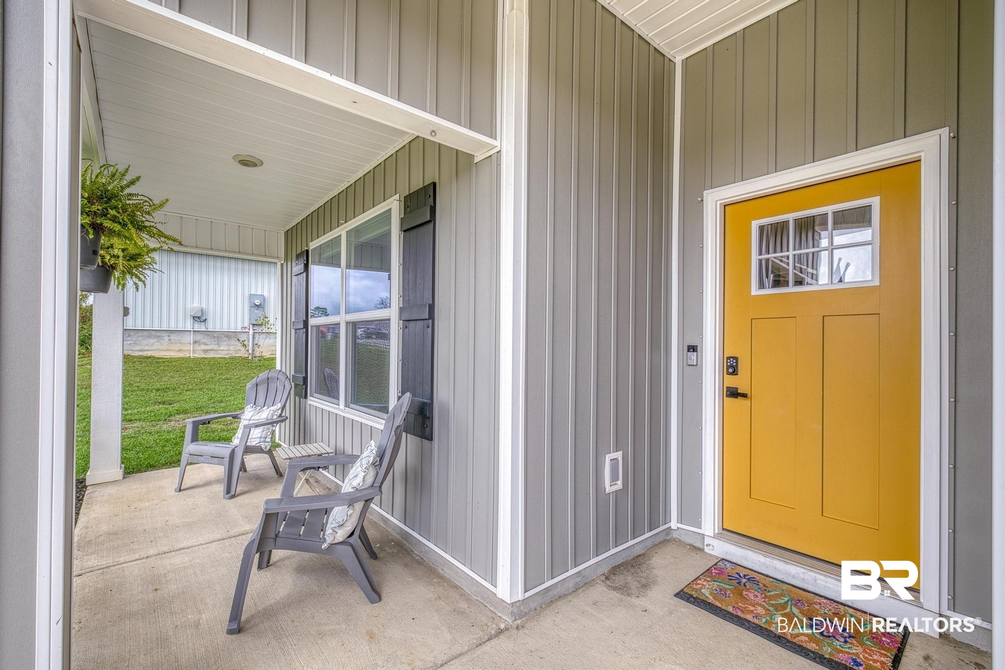 3078 Camino Real Loop Lillian, AL 36549 - Photo 3 of 51 Entrance to property featuring covered porch and board and batten siding