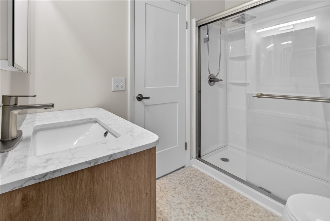 561 French Road Brighton, NY 14618 - Photo 25 of 45 FULL SIZED SHOWER W PLENTY OF SHELVES FOR PRODUCTS