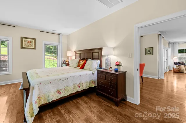 a bed room with a bed and a tv