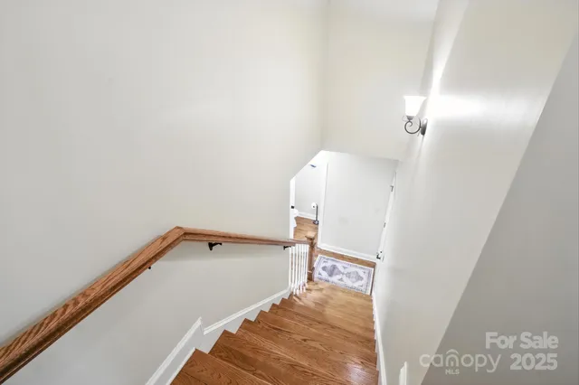 an aerial view of a house with yard