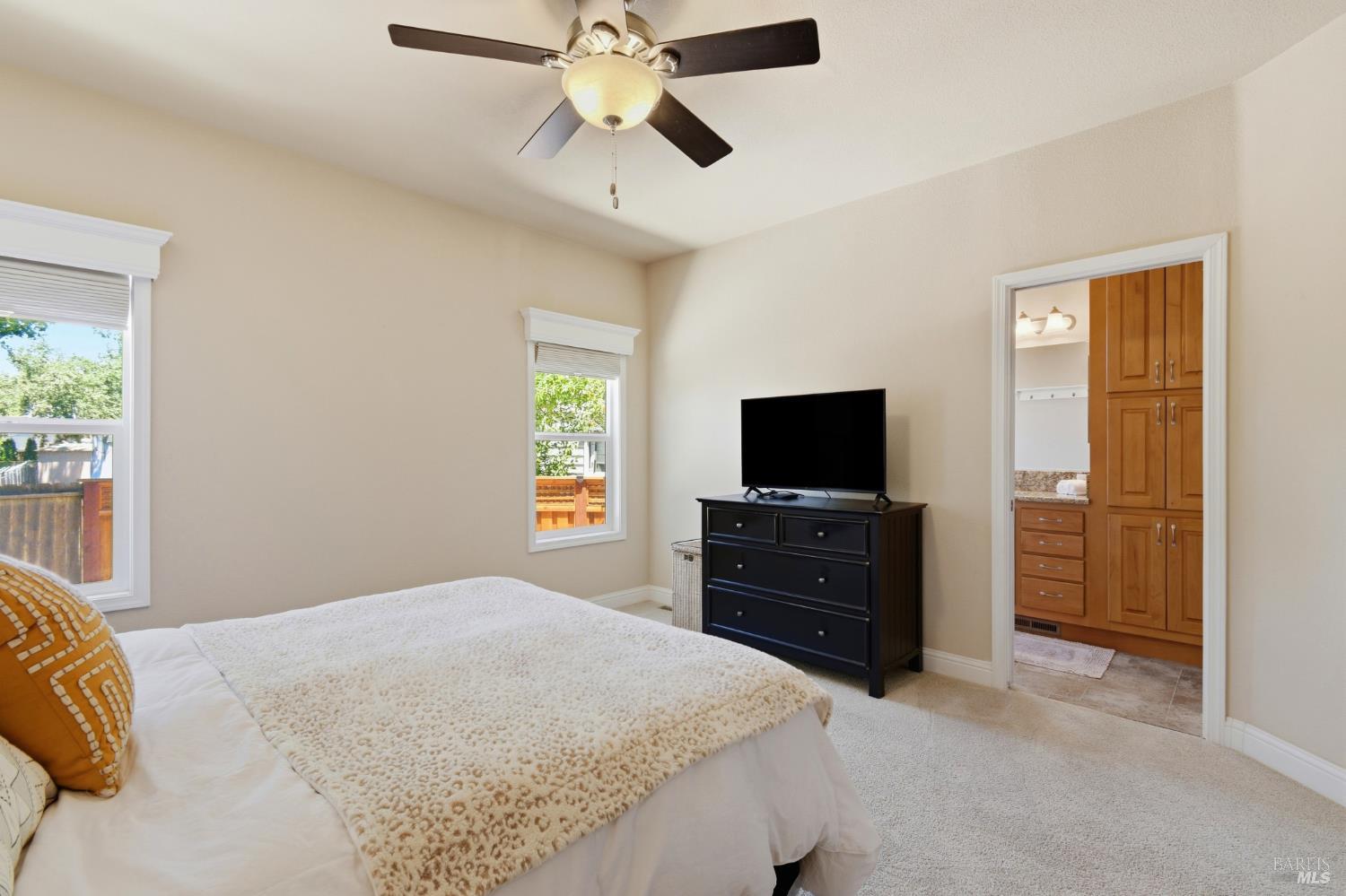 120 Shamrock Circle Santa Rosa, CA 95403 - Photo 22 of 45 a bedroom with a bed and a flat screen tv