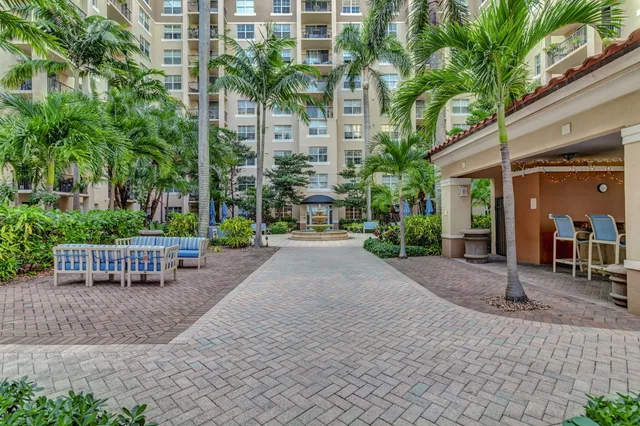 a view of a chairs and table in a patio