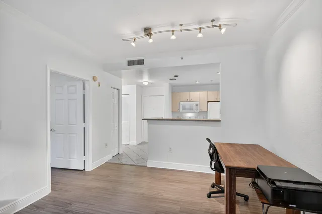 a workspace with wooden floor