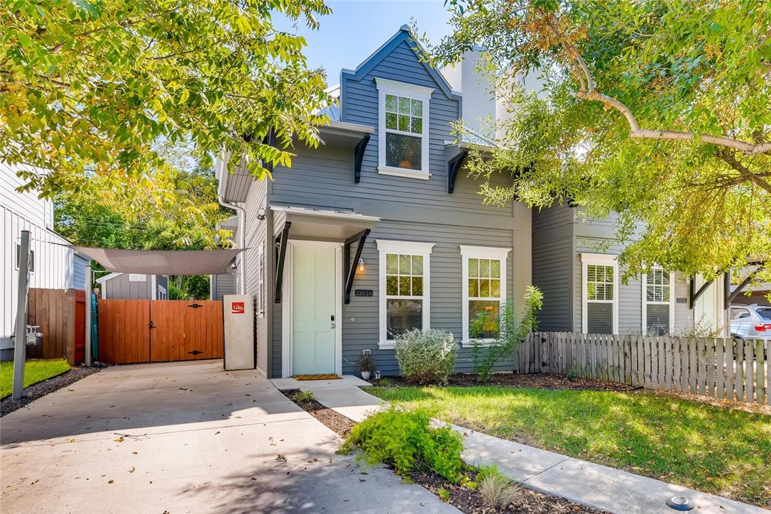 3203 Locke Lane, Unit A Austin, TX 78704 - Photo 1 of 1 front view of a house with a yard